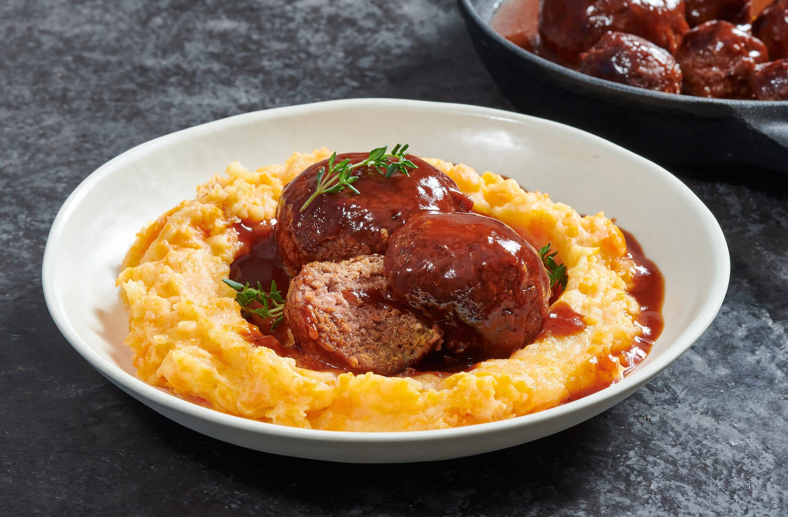 New Meatballs on Puree With Brown Sauce and Thyme