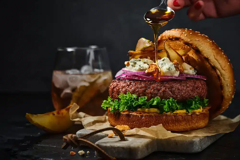 Redifine burger with blue cheese and caramelized pears